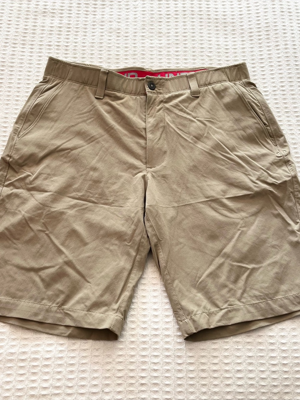Under Armour dark tan shorts size 36